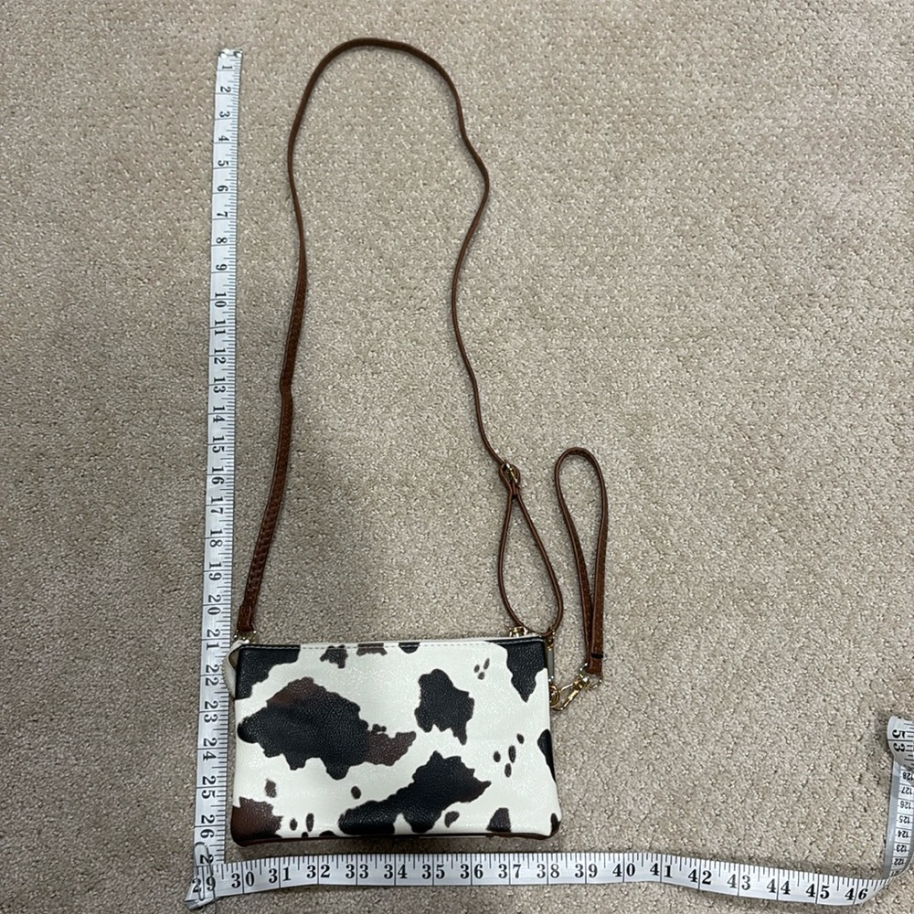 Small cow print crossbody brand new never used faux leather